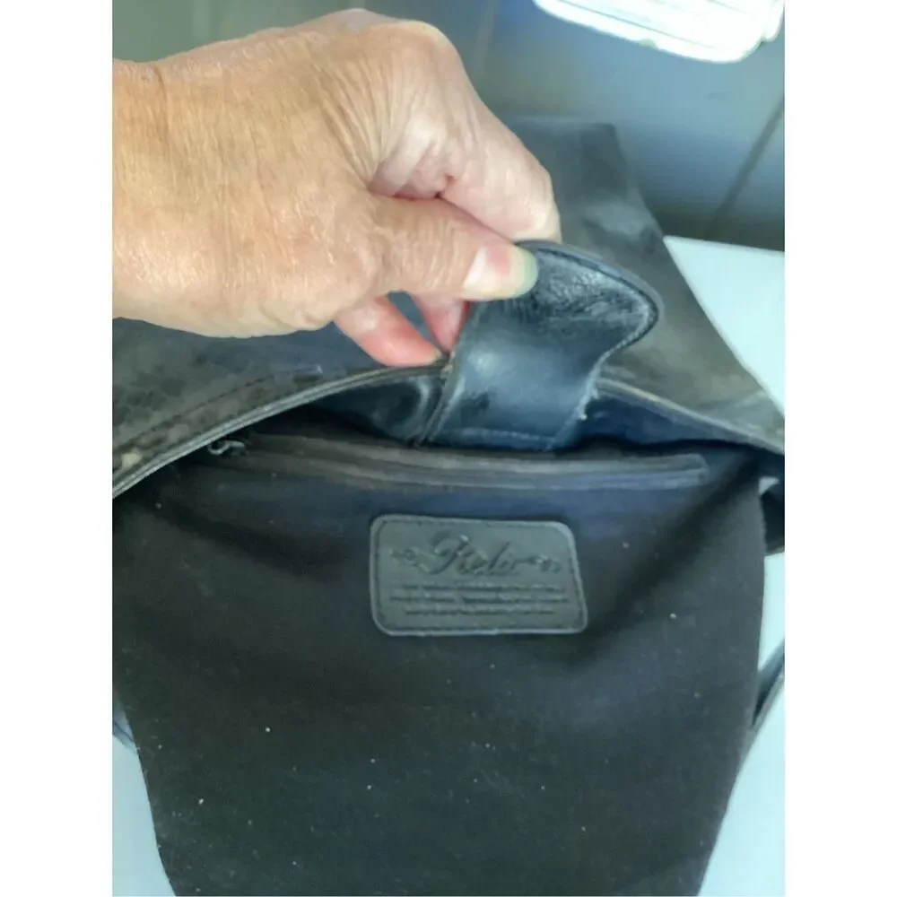 Relic Black Woven Crossbody Bag